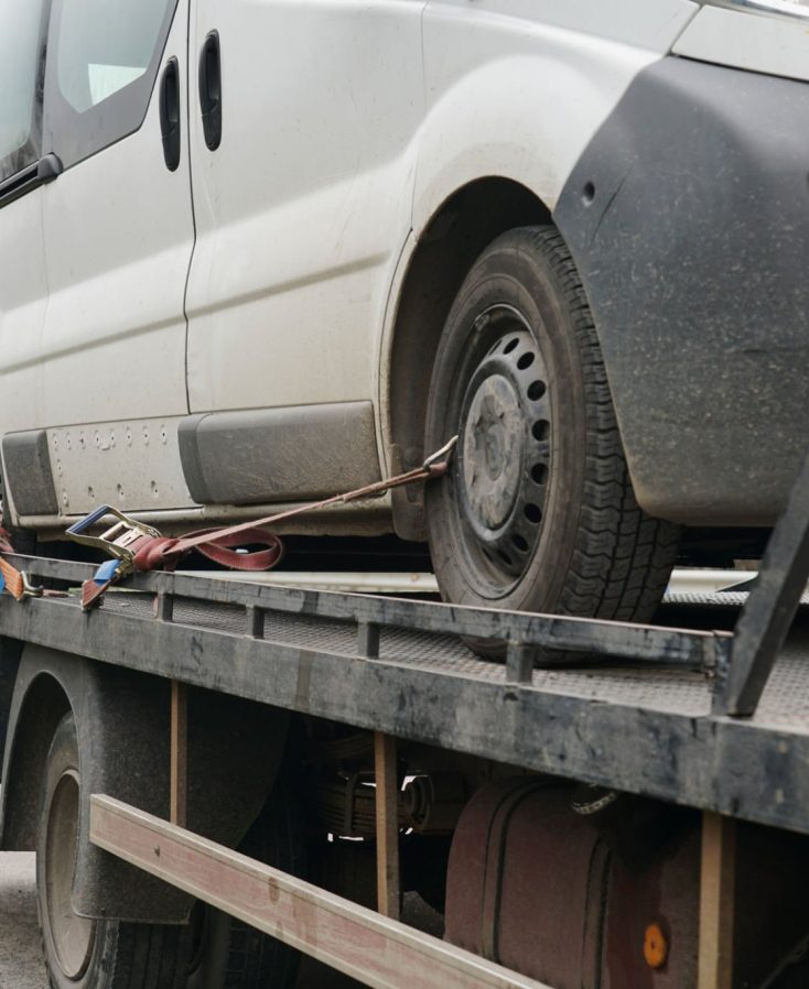 Loading a minibus onto a tow truck